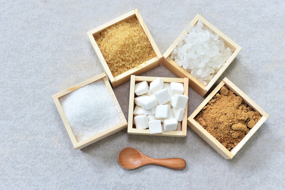 how much natural sugar per day
